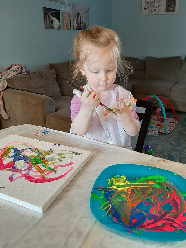 Child fingerpainting at Communnity Development Center of Lincoln County